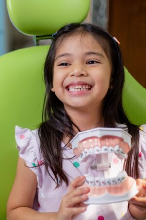 envato-labs-image-edit (11) smiling girl with ceramic braces