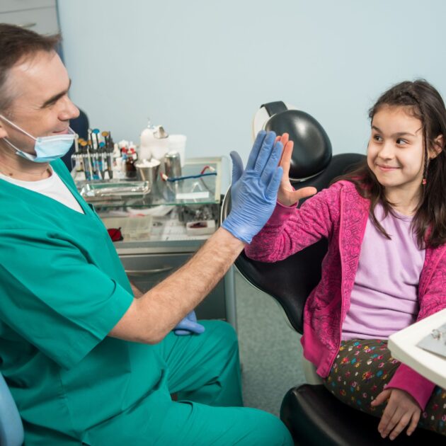 girl-with-on-the-first-dental-visit-senior-pediat-2025-01-16-22-37-42-utc