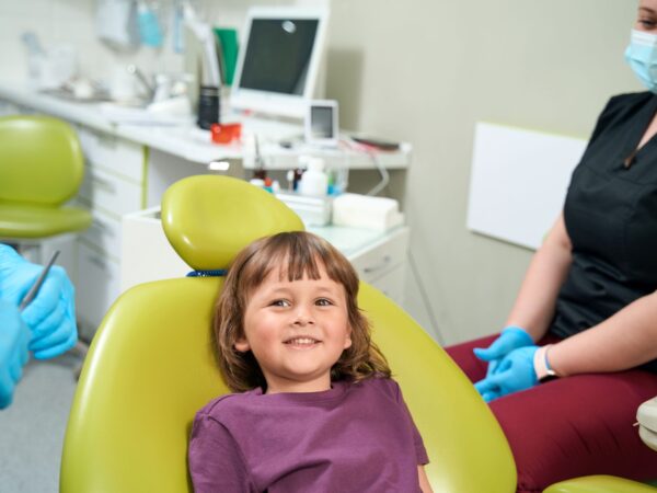 joyful-female-child-posing-for-camera-in-stomatolo-2024-10-20-12-40-11-utc greenwoods child at dental checkup and cleaning