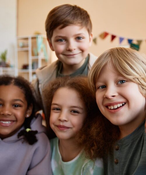 pov-of-group-of-happy-children-taking-selfie-photo-2025-03-09-06-56-48-utc Bunch of smiling and confident kids after early orthodontic evaluaitons
